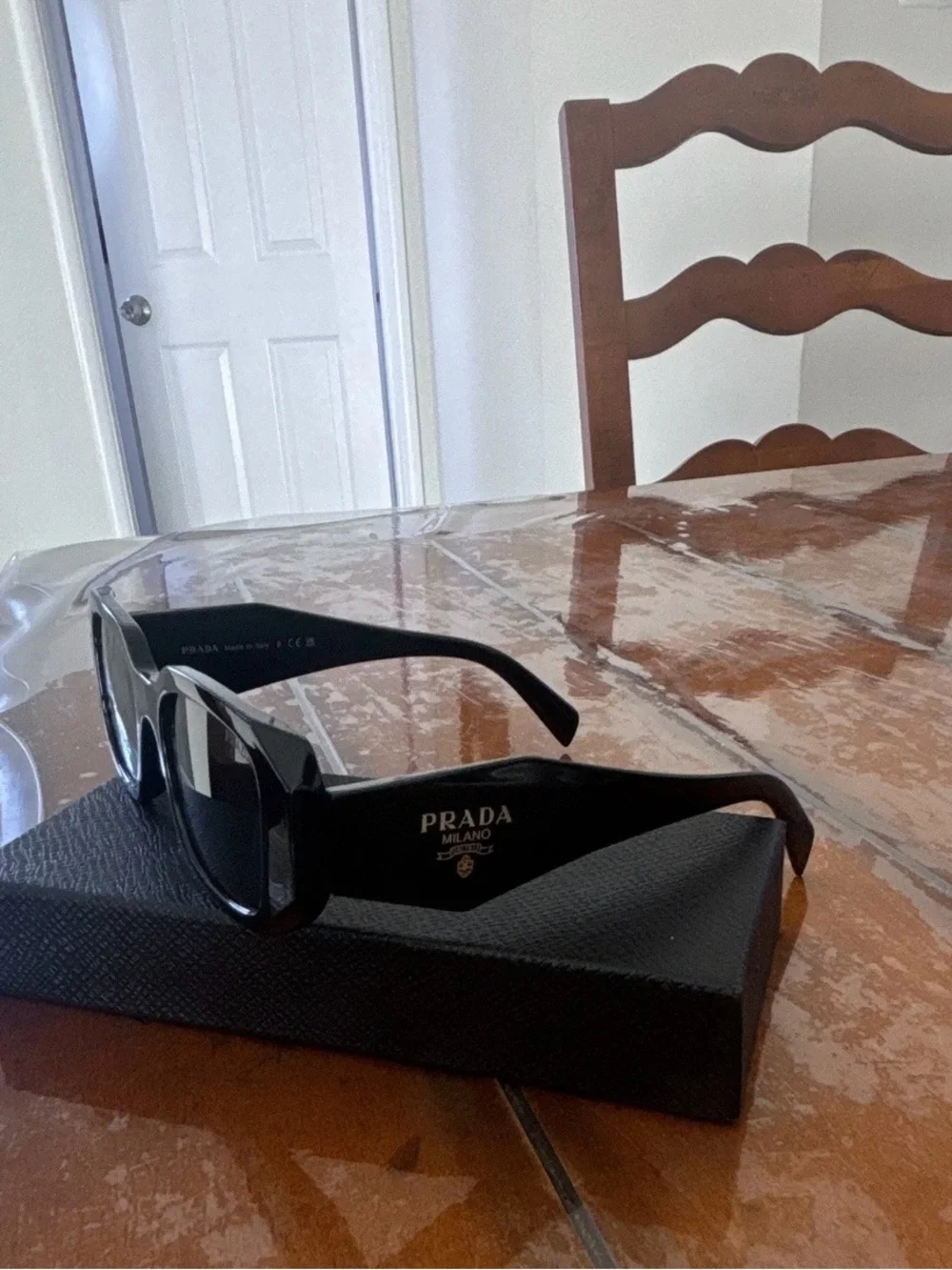 Prada Black Rectangular Sunglasses with Dark Lenses